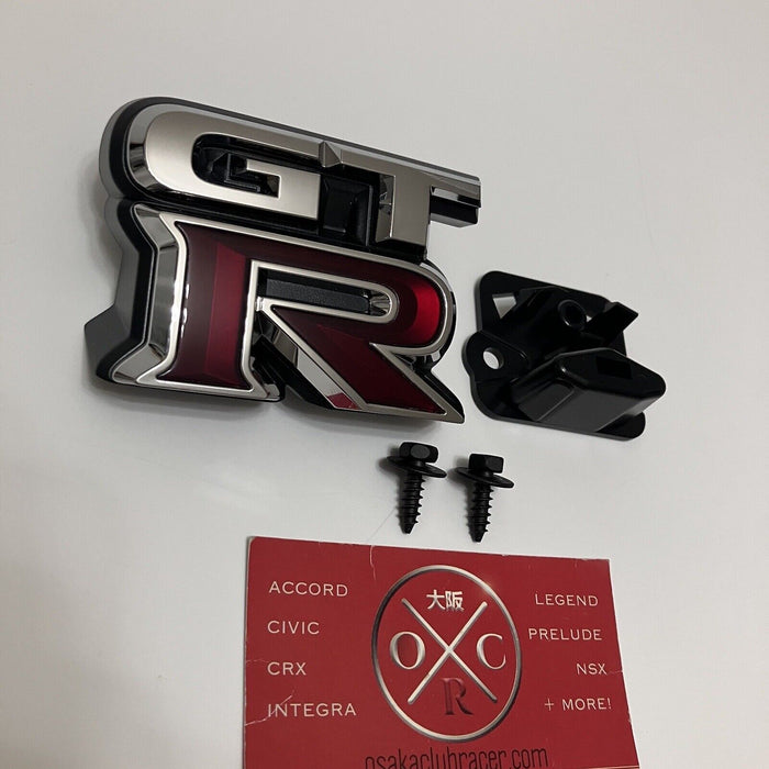 Genuine OEM 2009-2024 Nissan GT-R Front Grille Emblem & Bracket Set R35 Badge US