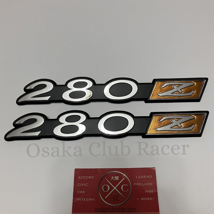 New Genuine OEM 1975-78 Datsun 280Z Fender Emblem Badge Set (2) S130 Fairlady Z