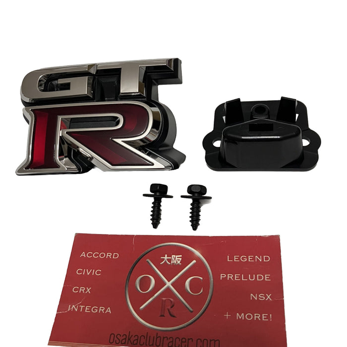 Genuine OEM 2009-2024 Nissan GT-R Front Grille Emblem & Bracket Set R35 Badge US